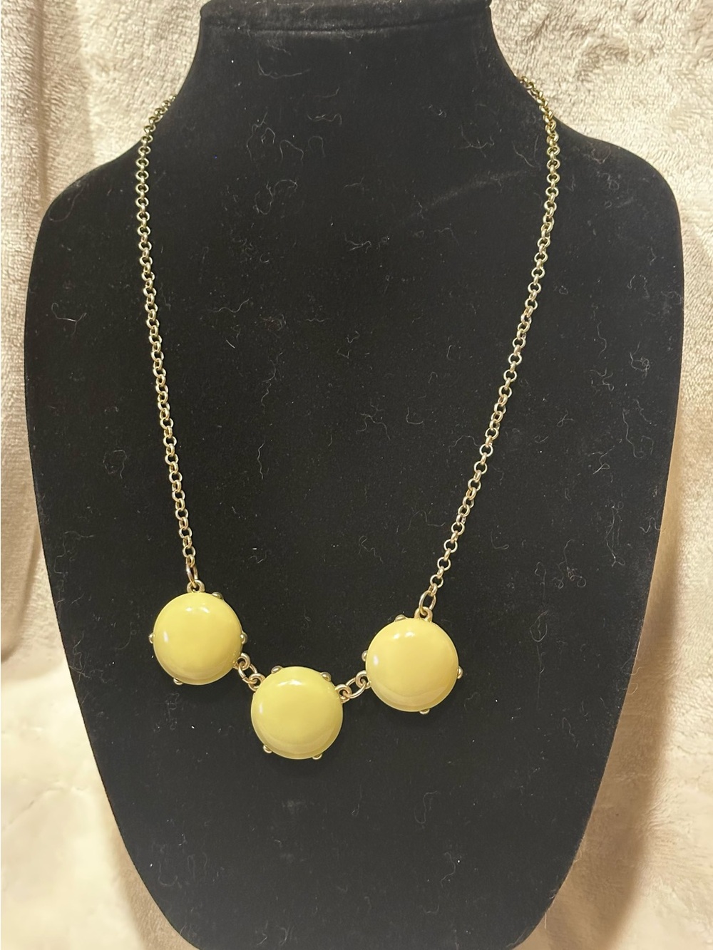 pale yellow cabochon statement necklace with a gold-tone chain glam